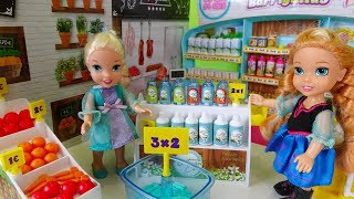 Elsa and Anna toddlers go shopping at the supermarket and buy toys [upl. by Tadashi40]