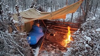 Winter Camping in Snow Storm with Survival Shelter amp Bushcraft Cot [upl. by Alabaster]