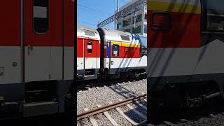 Gotthard Panorama Express train in railway station Altdorf Switzerland [upl. by Jarita884]