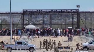 Migrants rush the Texas border in El Paso [upl. by Magill847]