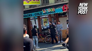 Liquor store worker pulls gun on mob of bicyclists surrounding CA store after they attack him [upl. by Eelrac]