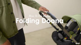 How to fold the Doona   Doona  Car Seat amp Stroller [upl. by Llyrpa]