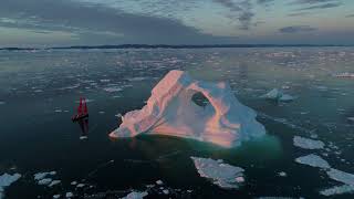 Fly over Greenland arch iceberg in midnight sun 4K  July 2018 [upl. by Giralda]