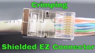 Shielded ezrj45 cat6 connectors being crimped [upl. by Bixby165]