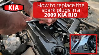 How to replace spark plugs for a 2009 Kia Rio [upl. by Orgel]