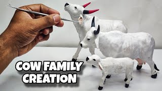 Sculpting clay Making Cow Family with clay  Clay Animals Art [upl. by Tyson]