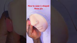 Wearing Lshaped nose pin kampala nosejewelry uganda nosering nosepierced nosejewelry [upl. by Adnima419]