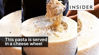 This pasta is served in a giant cheese wheel [upl. by Aiciram851]