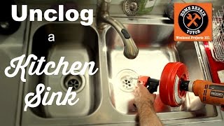 How to Unclog a Kitchen Sink Drain  by Home Repair Tutor [upl. by Araed]