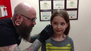 Seven year old gets her ears pierced needle method [upl. by Archibaldo]