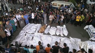 Bodies line up outside Gaza hospital as Israeli airstrikes continue [upl. by Ikim]