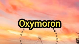 Oxymoron Definition amp Meaning [upl. by Ueihtam]