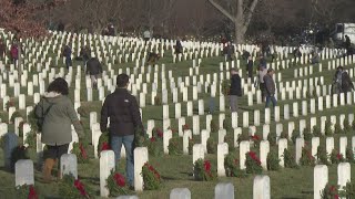 Wreaths Across America Mainemade wreaths mark graves at Arlington National Cemetery [upl. by Elehcir]