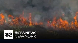 Brush fire in Secaucus snarls NJ Transit Turnpike traffic [upl. by Koren]