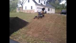 Vermeer S800TX Mini Skid Steer with Harley Rake Attachment [upl. by Dave562]