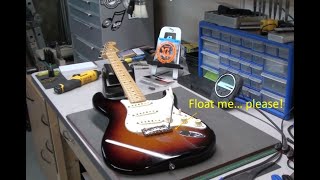 How To SetUp a Fender Stratocaster with a Floating Tremolo String Action Neck Relief amp Intonation [upl. by Zacharias]