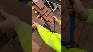 Using the cropper to cut clay tile subscribe roof construction roofer [upl. by Latisha]