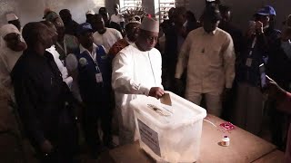 Senegals outgoing President Macky Sall casts his ballot  AFP [upl. by Shaine938]