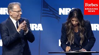 BREAKING NEWS Kristi Noem Signs Executive Order To Protect Gun Rights At NRA Convention [upl. by Arymahs328]