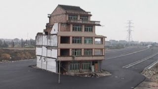 Motorway built around home in China [upl. by Talich]