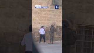 Israeli soldier assaults disabled man in Hebron shorts trending explore [upl. by Odnala]