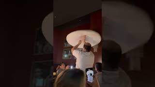 Skilled Guy Spinning and Tossing Pizza Dough at a Restaurant [upl. by Sybley312]