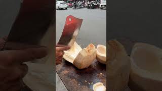 Simple way to peel coconut shorts explore streetfood streetfruits coconut viralvideo [upl. by Flyn]