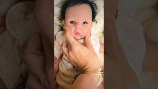 Squishing Cheeks of Silicone Reborn Baby Doll dolls dollcollector [upl. by Elletnahc890]