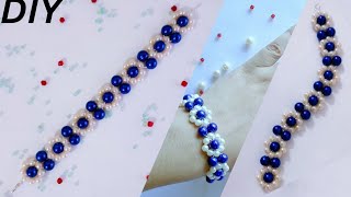 Flowers Beads BraceletHow To Make A Pearl Beaded BraceletDaisy Flowers BraceletLove For Beads2024 [upl. by Elauqsap]