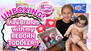 UNBOXING MINI BRANDS with my REBORN TODDLER [upl. by Lani384]