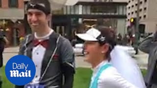 Sporty couple gets married in the middle of a marathon in Michigan [upl. by Robinet]