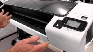 HP Designjet T1300 printer  how to load rolls of media [upl. by Sanferd]