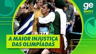 HOMEM INVADE MARATONA E TIRA OURO DE MARATONISTA BRASILEIRO EM 2004  shorts  geglobo [upl. by Ahseital812]