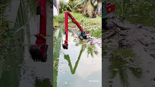 RC long boom excavator is building a dike for a small canal [upl. by Lansing]