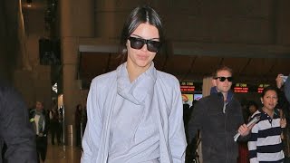 FreshFaced Kendall Jenner Rocks Grey Jumpsuit And Matching Overcoat At LAX [upl. by Durno]