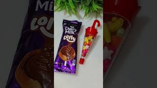 Dairy Milk Lolly amp Umbrella Gems Chocolate Popsicle shorts youtubeshorts [upl. by Rovelli574]