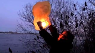 Lighting a wishing lantern on a windy day [upl. by Arrej]