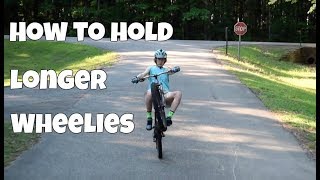 How to wheelie a mountain bike for a long time [upl. by Enelyak]