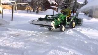 John Deere 1026 r snowblowing [upl. by Ennad]