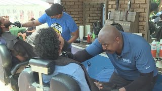 Man brings mobile barbershop to Juneteenth event to support KCPS Foundation [upl. by Lled]