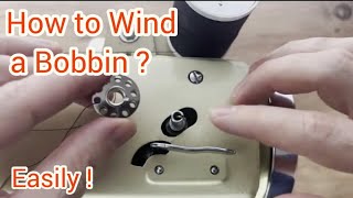 How to wind a bobbin on a sewing machine [upl. by Airamalegna]