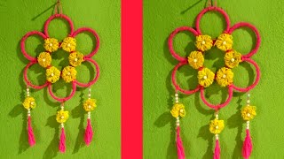 Super Easy Woolen Flower Wall Hanging Craft l Woolen Thread Craft Ideas Woolen Wall Hanging Design [upl. by Cromwell503]