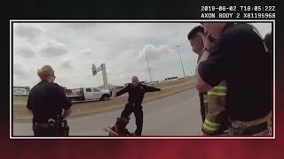 Fired Dallas paramedic caught on camera kicking punching homeless man gets reinstated but demoted [upl. by Rysler950]