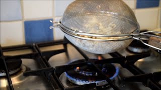 How To Make Popcorn in a sieve [upl. by Ymmot173]