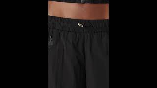 ELLESSE Zipp Trousers Sports Jogging Pants Polyamide Nylon Shiny Black Women  Zalando [upl. by Acimad]