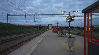 Sweden Stockholm Rotebro Train Station Arlanda Express passing by [upl. by Xirtaeb467]