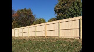 How to install a Wood Stocade Fence [upl. by Seuqcaj]