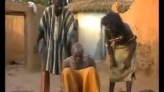 African Witch Doctor Slaps Guys Head [upl. by Llerrem]