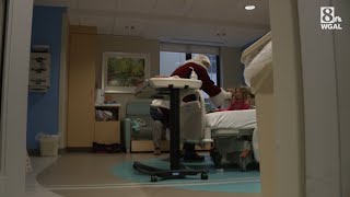 Santa hands out presents to young patients at UPMC Harrisburg [upl. by Nuahsak]