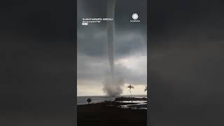 Powerful Waterspout Damages Buildings in Venezuela [upl. by Sirtaeb]